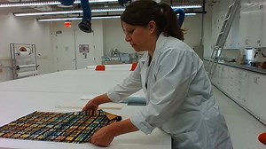 What is the best way to store a flat textile?