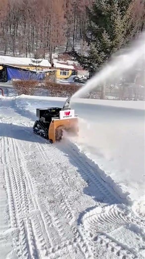 Powerful Remote Control Snow Blower Clearing Heavy Snow with Ease
