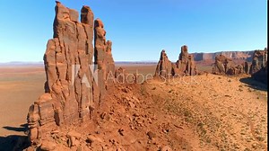MONUMENT VALLEY, ARIZONA, USA. Aerial 4K view of the high sharp peaks of the Monument Valley. Footage of the biggest natural monument in US.
