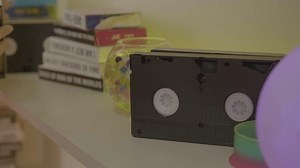 Free stock video - Vhs cassettes on a shelf