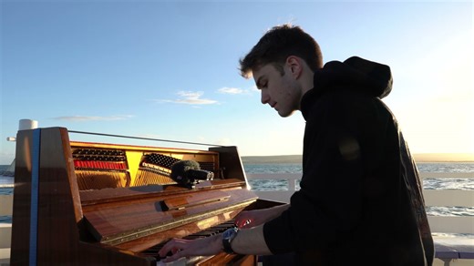 Playing a medley on a rented boat