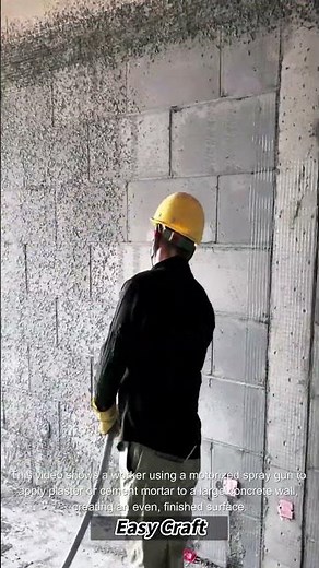 The process of spraying plaster onto a wall