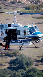 Distinctive blade slap of the Bell UH-1/205 series… This is a Bell 205 from San Diego County Sheriff’s Office during hoist training in the hills. #sandiego #helicopter #flying #aviationlovers | Lloyd H Photography