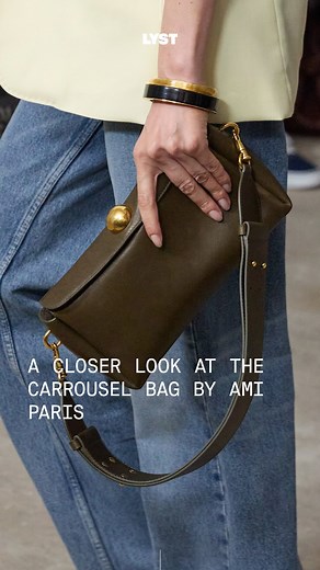 LYST on Instagram: "Take a closer look at @AmiParis’s Carrousel bag. Low-profile yet on-trend, it features a wide top opening fastened with an engraved gold dome, making it the perfect companion for everyday wear. First unveiled at the Spring-Summer ’25 show, the Carrousel bag comes in various sizes and materials, from leather to suede, in shades ranging from black and chocolate to cinnamon and lime green. #Ami #LystPartner"