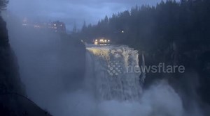 Massive water flow at Snoqualmie Falls during river storm, Washington, USA