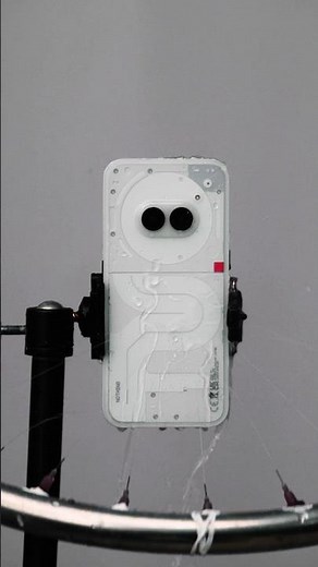 Phone (2a) water test. Reliability under pressure with an IP54 rating for water and dust resistance.