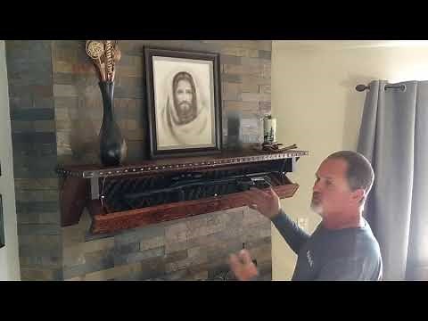 Gun hide fireplace mantle