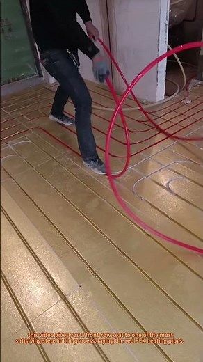 Installing Radiant Floor Heating: Laying Red PEX Pipe for Cozy Warmth!