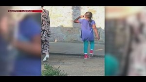 Woman arrested after keeping children in dog kennel