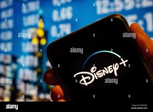 In this photo illustration, the online video streaming subscription service platform owned and operated by Disney, Disney  (plus), logo is displayed on a smartphone screen. (Photo by Budrul Chukrut / SOPA Images/Sipa USA Stock Photo - Alamy