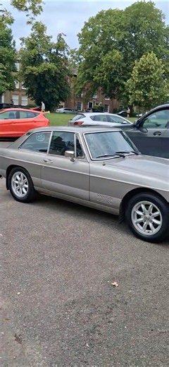 A 1981- 82 MGB GT PICTURED IN WELLS NEXT THE SEA.