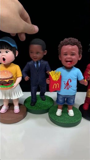 Handmade Clay Bobbleheads Bringing Smiles with Sways