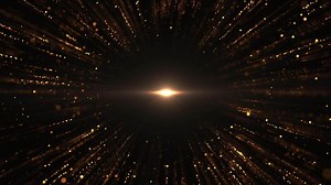 Abstract explosion of orange-gold dust particles in space. Optical effect of lens flare.