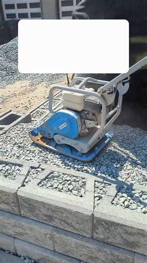 This is block level #2 and we’re already compacting behind the Allan Block wall. A lot of contractors rush this… or skip it completely. We don’t. And we have realized that the wall is always stronger when it has proper compaction on top of the blocks and behind it. Agree or disagree?👇 #RetainingWall #AllanBlock #HardscapeLife #ConstructionReels #BlueCollarLife #TradesOfInstagram #BuiltRight #Compaction #JobsiteTruth #ContractorLife #NoShortcuts #LangleyBC #BCContractor | Action Hardscapes Limit