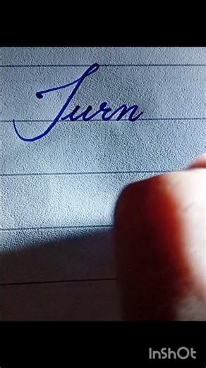 Writing 'Turn' in Elegant Cursive Handwriting