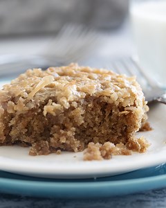 This Oatmeal Cake is an old fashioned cake that is absolutely irresistable! It's made from pantry staples, and is one of those cakes you can whip up at a moment's notice. Get the full recipe here: https://www.tasteandtellblog.com/oatmeal-cake/ | Taste and Tell