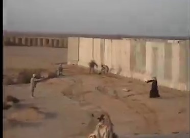 Iraqi man gets tackled by US soldiers