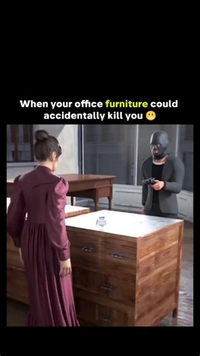 Athletics on Instagram: "The post spotlights a 31‑second animated explainer by @zackdfilms that dives into one of history’s strangest security inventions: a 19th‑century anti‑robbery “desk gun.” In the animation, a store clerk steps on a foot pedal, causing the desk to flip upright as a shield, while a rope trigger fires a hidden pistol at the robber and simultaneously slides the cash into a locked drawer. It feels like something straight out of a steampunk film, which is exactly why it grabs at