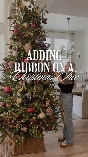 Kaycie | Interior Design, DIY on Instagram: "This is such an easy way to add ribbon to your Christmas tree! Comment RIBBON for the source and a discount code to the ribbon and other ornaments I have in my tree! #christmastree #christmas #christmasdecor #christmasdecor"