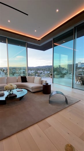 8899 Beverly on Instagram: "SEAMLESS VIEWS & ELEVATED DESIGN // Discover the perfect blend of luxury and innovation. The Vitrocsa invisible operable glazing system takes center stage in every residence at 8899 Beverly, offering unobstructed vistas that blur the line between indoors and out. These exquisite glass doors elevate each space, paired with floor-to-ceiling windows, soaring ceilings, and Italian silver travertine floors. In the Penthouse, the experience reaches new heights with fully au