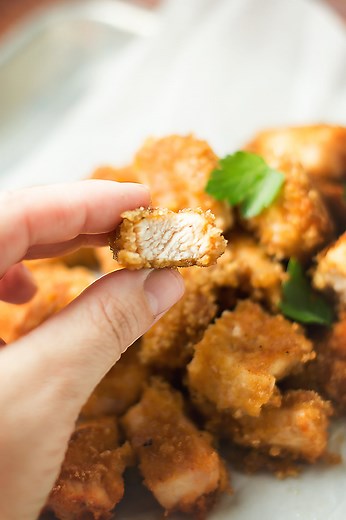 Chunks of chicken coated in a pork rind dust and then fried until golden brown! These pork rind Keto chicken nuggets are crunchy, smoky, juicy, and golden brown. they are so flavorful and easy to make! Printable Recipe: https://jenniferbanz.com/pork-rind-crusted-chicken-nuggets | Low Carb Recipes with Jennifer