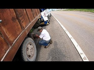Helping a Farmer Loaded Grain Truck Rear Tow