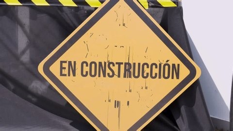 clip-3801775587-yellow-“under-construction”-sign-warning-ongoing-work