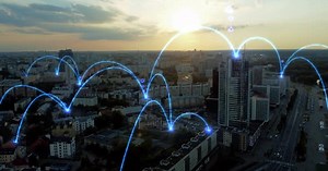 Social media emoji icons appear in different parts of the city.