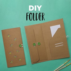 DIY Folder | Simple Organizer Ideas | How to make a Folder Learn how to make a useful folder with this tutorial! These are great for storing documents, receipts & photos. Materials Required :- - Glue - Scissors - Thread & Needles - Elastic Thread - Buttons - Card Stock #DIYFolder #tutorial #organizer Our Social Media: Watch more: http://www.21frames.in/artalltheway Follow us on Instagram: https://www.instagram.com/ventunoart Follow us on Facebook: https://www.facebook.com/ArtAllTheWay | Art All 