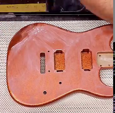 Take a look at this Custom Shop Charvel in Sunfire Orange Sparkle from the bench of Basecoat Blockhead.🍊What would you play on this? | Charvel® Guitars