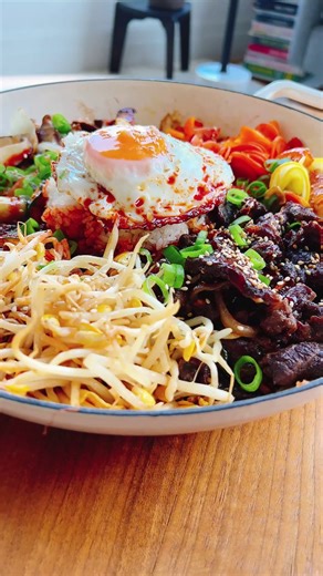 Bulgogi bibimbap is one of those dishes that looks fancy but is totally doable at home. Get the full recipe here: https://iheartumami.com/bulgogi-bibimbap/ This version is made in one big skillet — tender bulgogi beef, colorful veggies, rice, and a bold gochujang sauce all come together without the fuss. It’s cozy, family-style comfort food that’s perfect for a Sunday family dinner. Bring it to the table, mix it up, and let everyone dig in. It’s simple, hearty, and full of flavor you’ll want to 