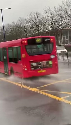 People getting absolutely splashed by big puddles!