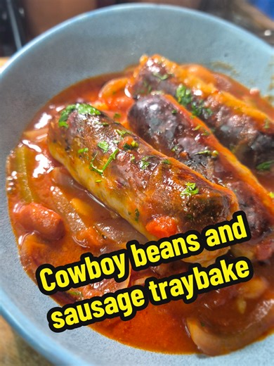 Sweet-spicy cowboy beans and sauasge. One tray. No mess 🤌🔥 This one disappears FAST. #Foodie #Recipe #homecooking #fyp Ingredients 2 tbsp smoked paprika 4 garlic cloves crushed 1 tbsp vegetable oil 1 red onion chopped 1 green pepper – chunks 420g baked beans 400g chopped tomatoes 1 veg stock – 300 ml water 454g sausages 20g fresh parsley Salt pepper for seasoning Pre heat oven Gas 7 – 220°C – fan 200°C On a tray – mix onions, pepper, baked beans, tomatoes, stock, greens, 1 tbsp of paprika, 2 g
