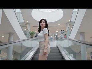 A Tokyo woman in a mini skirt walking up the stairs