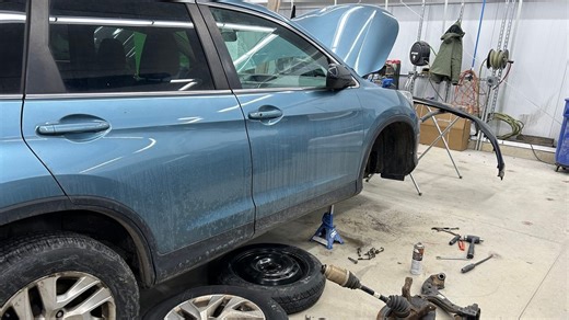 How auto repair body shops handle large volumes of damaged cars