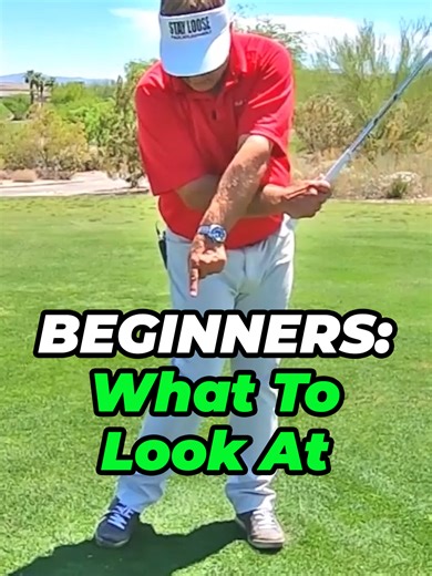What To Look At When You Swing? (Beginners Tip) Not all golfers should be looking at the same things as the hit the ball. Step one for beginners is to stop looking to early for your ball. If you come out of it you will most likely top the ball. Couple this with a chicken wing from hitting with your arms and you may miss it completely. So if you're a beginner start working on this first. The goal for you is to get every ball airborne. Once you can do that you are on your way to learning a great g