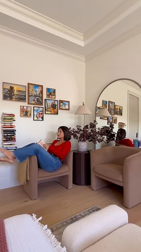 Kim Bui on Instagram: "Who knew a dish rack could double as a bookshelf? Thanks @grillodesigns for this brilliant hack. I used Command Strips to hang them so it’s totally renter-friendly! I love how cozy our reading nook feels. Also loving this side table — it’s pretty and has hidden storage (you know I love a good functional piece). Comment Shop for sources to be sent to you. https://liketk.it/5qX7D #homedecor #organizationideas #readingnook"