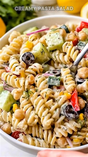 Pasta tossed creamy. Stir mayo, yogurt, lemon. Chill until cool. This creamy pasta salad is fresh, tangy, and ultra-satisfying—tender pasta, crunchy veggies, and a smooth, zesty dressing in every bite. Ingredients ➤ 8 oz short pasta (fusilli, rotini, or elbows) ➤ 1 can (15 oz) white beans, drained (or 1½ cups cooked) ➤ 2 cups red bell pepper, chopped ➤ 1 heaping cup cucumber, chopped ➤ 1 shallot, chopped FULLL Recipe in First Cօʍʍеոτ 👇👇 | Nessy Recipes