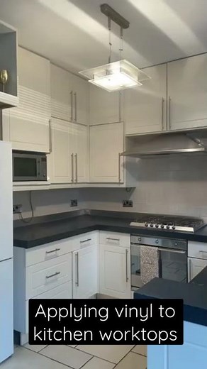 Applying vinyl to kitchen worktops