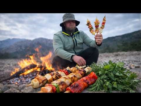 Cooking Trout, Potatoes and Peppers Over Open Fire