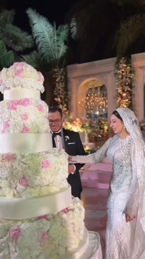 Egyptian Weddings on Instagram: "A Fairytale Moment 💕Catch the full Wedding Coverage in our Highlights 🤍 Congratulations to this Special Couple @nourhaneadel @osama_elazab93 ————————— - Weeding Planner : @hera.events_ @nourhan_el_hadad - Makeup Artist : @aya_elbatt - Photography & Videography: @harby.photography - Veil Designer : @maiiahmeed - Bridal Gown : @deux.tailleurs - Dj : @djkhaledhussein ______ ______ _______ #egyptianweddings #weddings #cake #makeup #love #bride #groom #makeupartist 