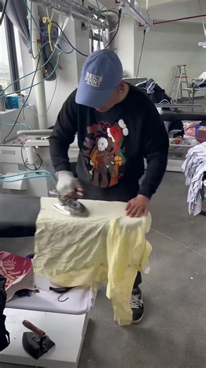 Behind the Scenes at a Clothing Factory: Ironing Shirts