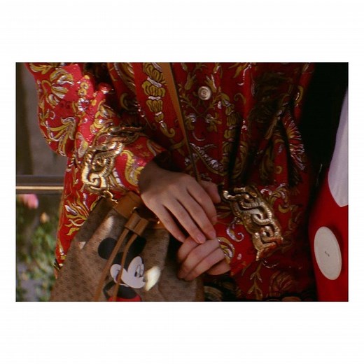 Enjoying a sunny day at Disneyland wearing the Disney X Gucci collection by Alessandro Michele: actor Earl Cave and designer, stylist and poet Zoë Bleu. ©Disney Discover the collection on.gucci.com/ChineseNewYear2020_. | Gucci