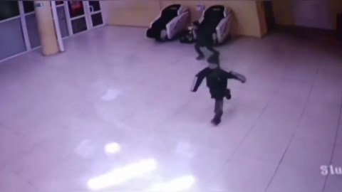 Naughty youngster triggers fire alarm and runs as sprinklers activate