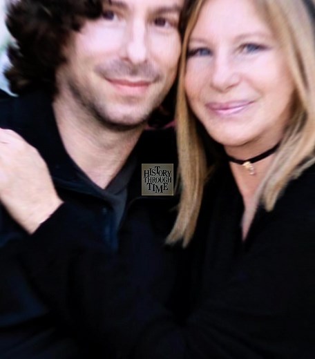 "Circa 1966, Barbra Streisand welcomed her only child, Jason Gould, born from her marriage to actor Elliott Gould, marking the start of a lifelong creative bond. As he grew, Jason carved his own artistic path as an actor, director, and singer, eventually sharing the stage with his legendary mother in beautifully harmonized duets that showcased their unmistakable connection. Their collaborations—from concerts to recordings—highlight a relationship built on mutual admiration and deep affection. To