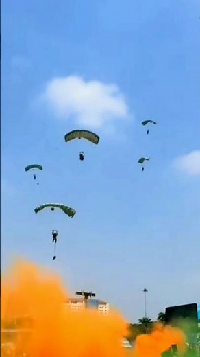 Spectacular Indonesian women's parachuting action