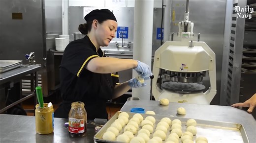 Inside US $13 billion nuclear aircraft carrier kitchen preparing meal for sailors