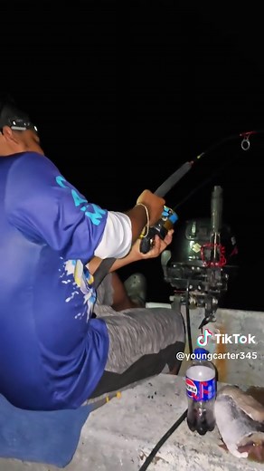 Cayman Islands night fishing Capt Kaleb Carter on a Dogtooth snapper #fishing #pennreels #bigbaitbigfish #snapper #dogtooth #goodfight #viral #reels
