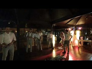 Groomsman strip suprise dance at Wedding
