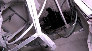 Security forces inspect debris-filled home after strike in Israel